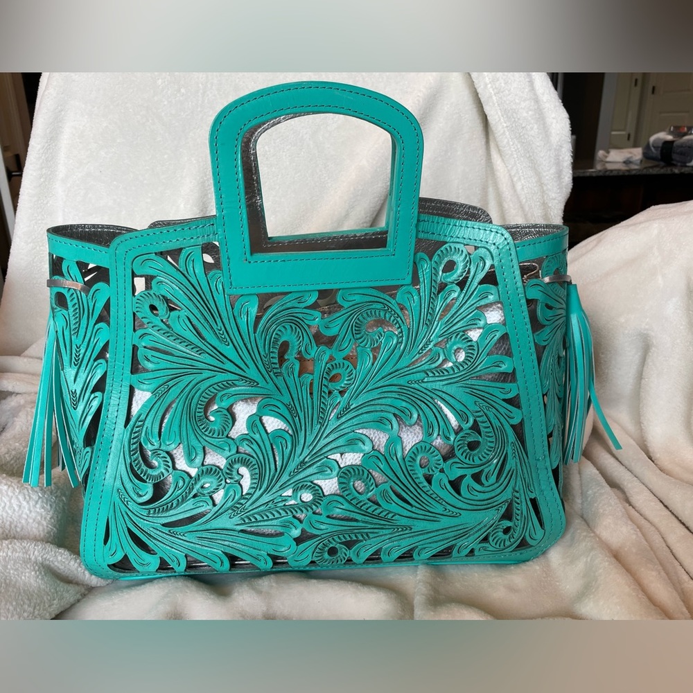 Runaway Luna genuine leather cut-out tote.